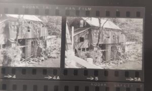 Feature image Black and white image of a crumbling mill in the moods.