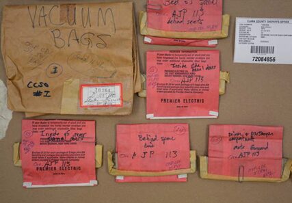 Police photo of evidence laid out on a table.